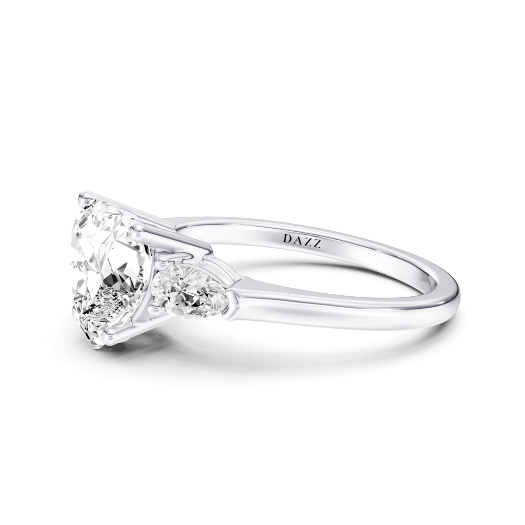 CORVELLE 3 STONE PEAR RING - heart
